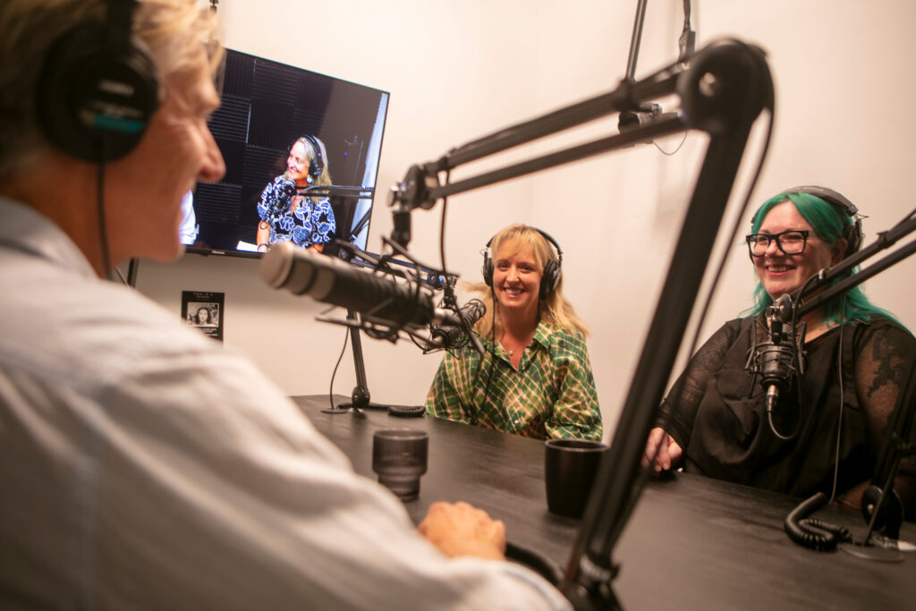 Photo of Podcast Empire team in action