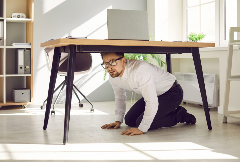Hiding under table