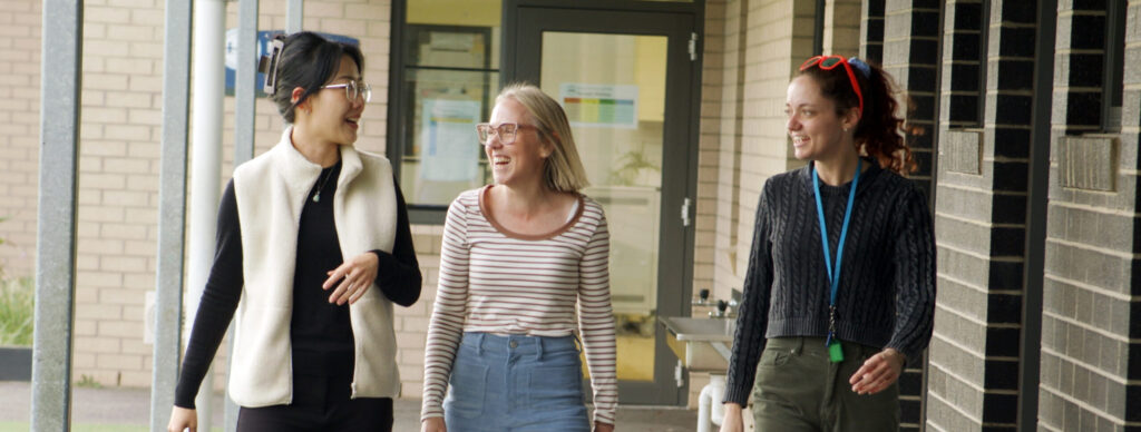 Case study of Noahs Ark and Dinjerra Primary School. KIm Nerissa and Mary walking and talking